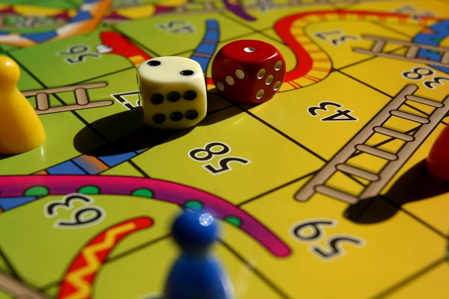 Ludo vs Snakes and Ladders: Which Is Better When You Play Board Games Online?